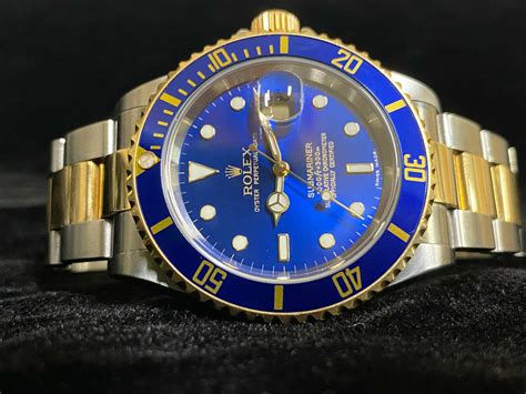 rolex blue and gold price|Rolex gold submariner blue face.